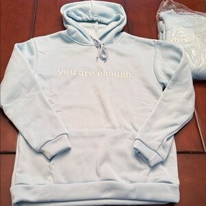 Light Blue Hoodie with Inspirational Message